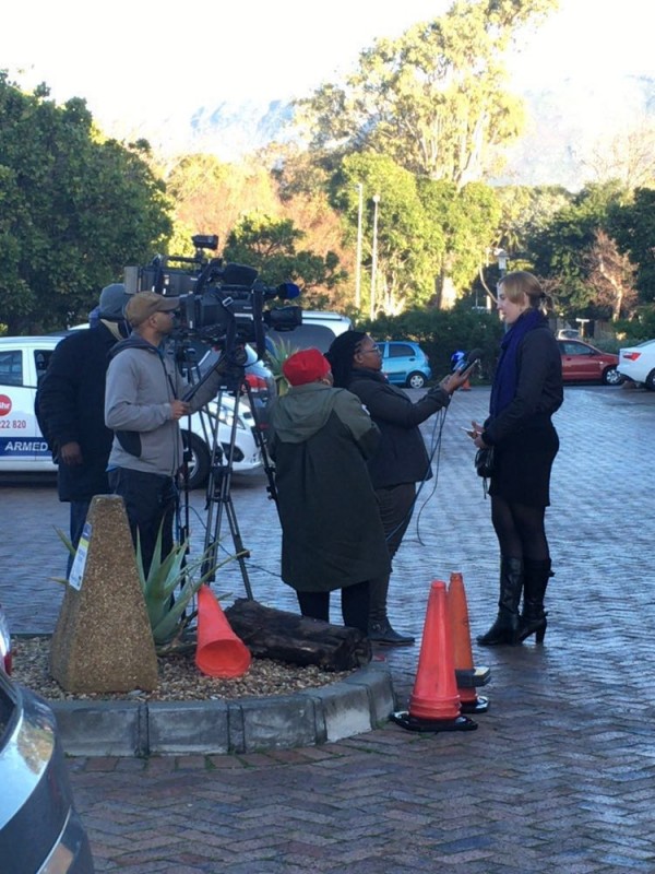 Greenpeace Africa's Climate and Energy Campaigner, Penny- Jane Cooke addresses media during the action as Greenpeace asks Pick n Pay to commit to the sun